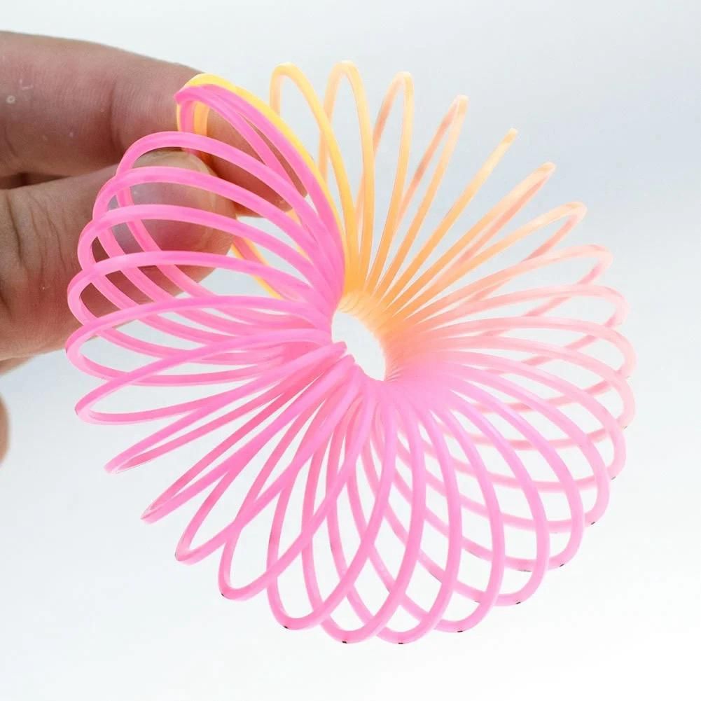 12Pcs Rainbow Smile Magic Springs Circle Toys for Children Birthday Party Favors Giveaway Gifts View Gallery - Pakistan