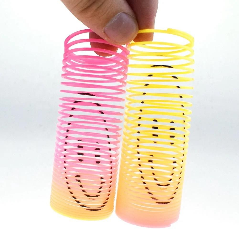 12Pcs Rainbow Smile Magic Springs Circle Toys for Children Birthday Party Favors Giveaway Gifts View Gallery - Pakistan