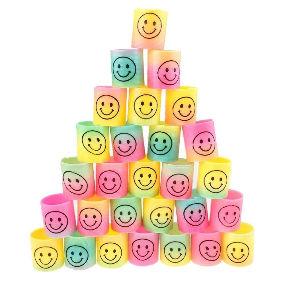 12Pcs Rainbow Smile Magic Springs Circle Toys for Children Birthday Party Favors Giveaway Gifts View Gallery - Pakistan